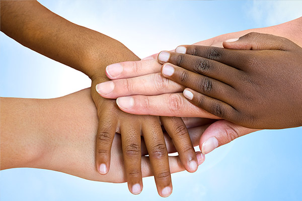 diverse children holding hands